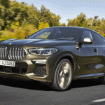 P90356693_highRes_the-new-bmw-x6-drivi copia